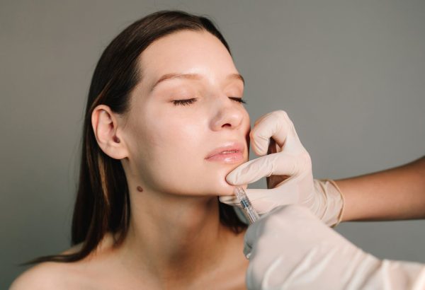 How Do Jawline Fillers Injections Work for Facial Sculpting?